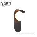 Decorative Wall Lamp Creative curling wall lamp black and white optional Supplier